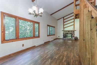 Nestled on two wooded lots just south of Waupaca, this 3BR, 2BA - photo 14