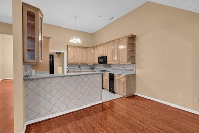 Nestled beneath mature oaks, this custom all-brick home offers a - photo 17