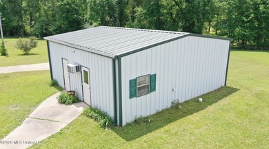 Nestled on five beautiful acres, this versatile property offers - photo 17