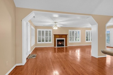Nestled beneath mature oaks, this custom all-brick home offers a - photo 21