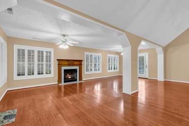 Nestled beneath mature oaks, this custom all-brick home offers a - photo 22