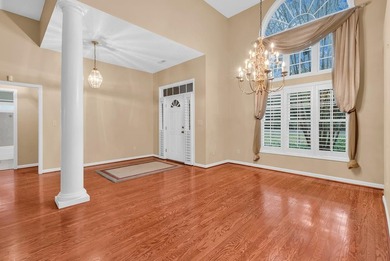 Nestled beneath mature oaks, this custom all-brick home offers a - photo 23