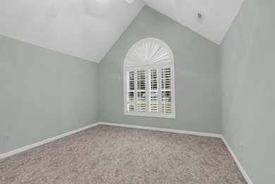 Nestled beneath mature oaks, this custom all-brick home offers a - photo 27