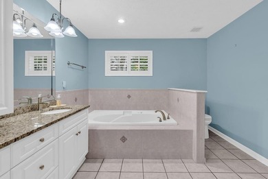 Nestled beneath mature oaks, this custom all-brick home offers a - photo 37