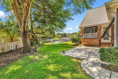 Nestled beneath mature oaks, this custom all-brick home offers a - photo 47