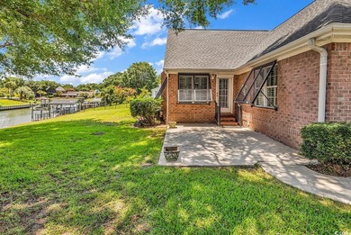 Nestled beneath mature oaks, this custom all-brick home offers a - photo 48