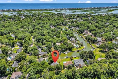 Nestled beneath mature oaks, this custom all-brick home offers a - photo 53