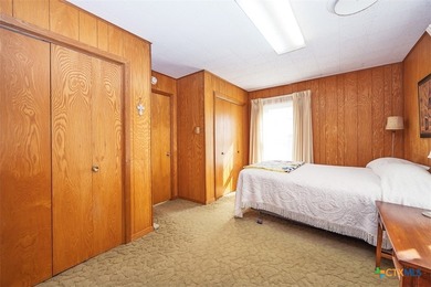 Set back from the road on 2.607 acres, this property offers a