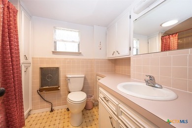 Set back from the road on 2.607 acres, this property offers a