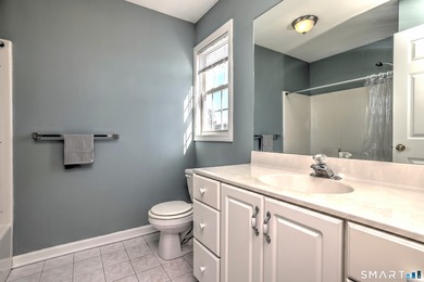 This gorgeous, sun-splashed end-unit townhouse-originally the