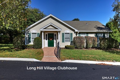 This gorgeous, sun-splashed end-unit townhouse-originally the