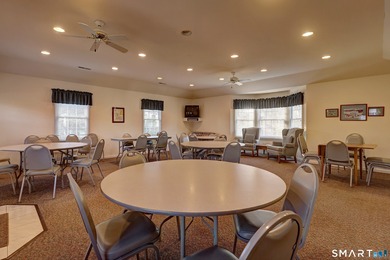 This gorgeous, sun-splashed end-unit townhouse-originally the