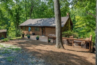 Well Maintained Log Cabin nestled in the trees in a peaceful - Lake Home Sale Pending in Leasburg, North Carolina