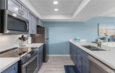 This beautifully remodeled, turn-key 2-bed/2-bath condo at Padre