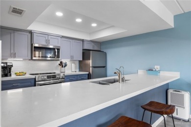 This beautifully remodeled, turn-key 2-bed/2-bath condo at Padre