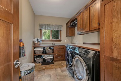 Tucked away on over two wooded acres in Sartell, this stunning - photo 16
