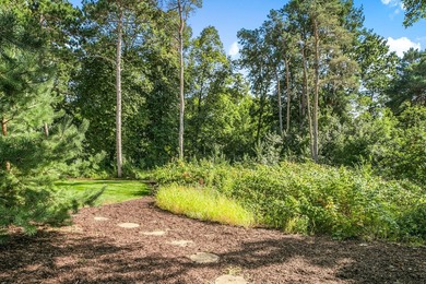 Tucked away on over two wooded acres in Sartell, this stunning - photo 42