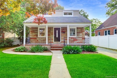 Outstanding and updated Cape Cod style home with gorgeous curb - photo 2
