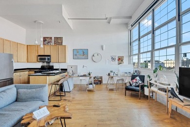 LOFT OF A LIFETIME Experience elevated loft living in this - photo 10