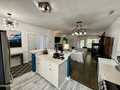 Welcome to this beautifully updated top-floor 2-bedroom, 2-bath