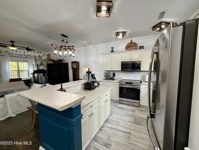 Welcome to this beautifully updated top-floor 2-bedroom, 2-bath