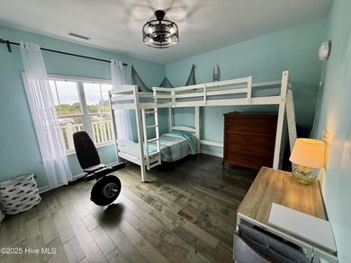 Welcome to this beautifully updated top-floor 2-bedroom, 2-bath