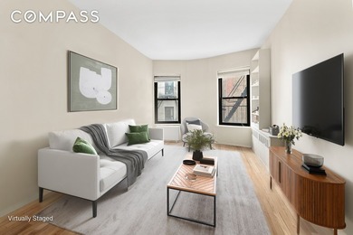Welcome to your serene oasis in the heart of Manhattan! This - photo 3