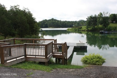 A beautiful lakefront home boasting mountain views, a boat dock - photo 36