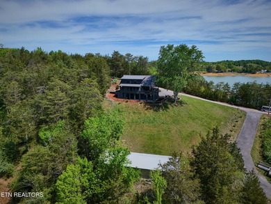A beautiful lakefront home boasting mountain views, a boat dock - photo 44