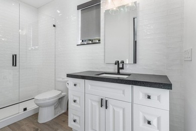 Completely Designer 6 BD 5.5 BA in Devon Place with elevated - photo 23
