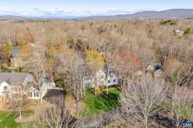 Located in desirable Glenmore, this four bedroom, three and a - photo 2
