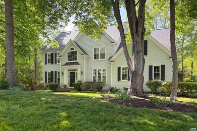 Located in desirable Glenmore, this four bedroom, three and a - photo 3