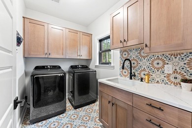 Nestled on 1.5 acres in Bellwood Landing, this custom-built home - photo 24