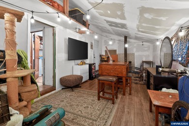 Coastal cottage full of character and opportunity. Wood siding