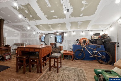 Coastal cottage full of character and opportunity. Wood siding