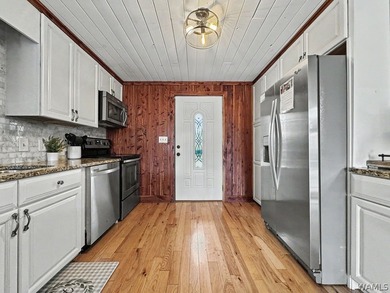 Experience the beauty of Lake Tuscaloosa at this delightful - photo 6