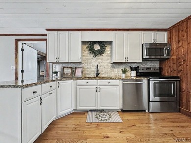 Experience the beauty of Lake Tuscaloosa at this delightful - photo 7