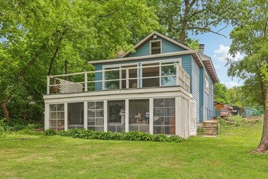 Discover an unparalleled Chain of Lakes lakefront retreat, with - photo 1