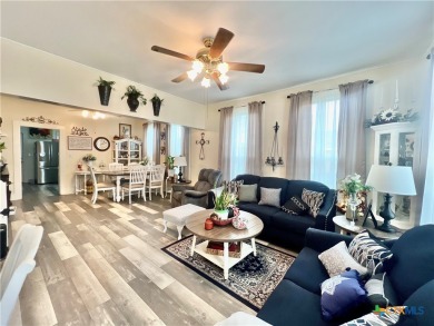 This inviting home offers lots of natural lighting. Its's been