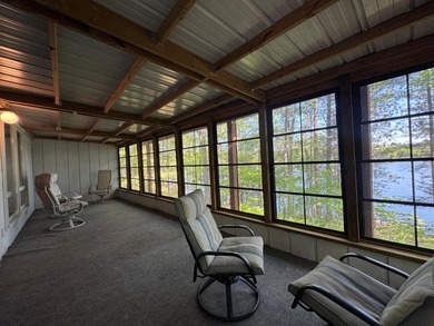 Nestled on a wooded lot on beautiful 204 AC BOOTH lake, this - photo 12