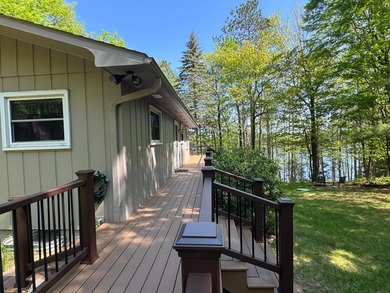 Nestled on a wooded lot on beautiful 204 AC BOOTH lake, this - photo 14