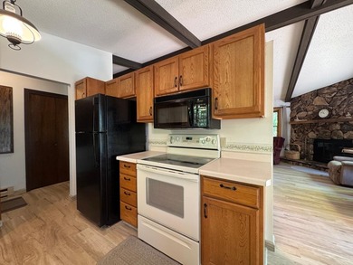 Nestled on a wooded lot on beautiful 204 AC BOOTH lake, this - photo 18