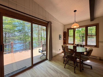 Nestled on a wooded lot on beautiful 204 AC BOOTH lake, this - photo 19