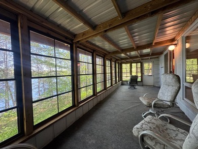 Nestled on a wooded lot on beautiful 204 AC BOOTH lake, this - photo 25