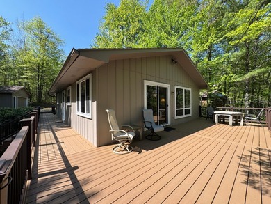 Nestled on a wooded lot on beautiful 204 AC BOOTH lake, this - photo 31