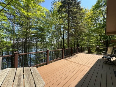 Nestled on a wooded lot on beautiful 204 AC BOOTH lake, this - photo 32