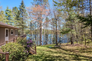 Nestled on a wooded lot on beautiful 204 AC BOOTH lake, this - photo 33