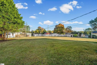 Welcome to 108 Belmont Circle -- a charming 3 or 4 bedroom, 1