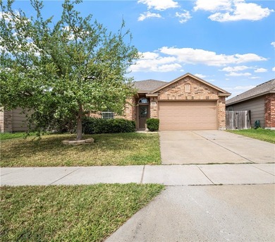 Charming 3-bedroom, 2-bath home with a 2-car garage located in - photo 1