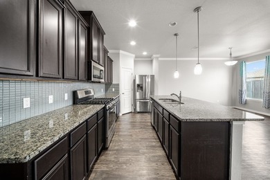 Charming 3-bedroom, 2-bath home with a 2-car garage located in - photo 8